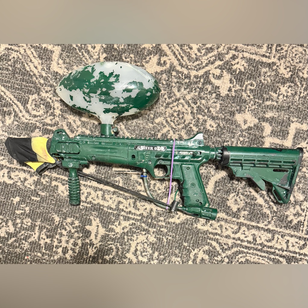 Green Tactical Rifle With Adjustable Stock And Optical Sight